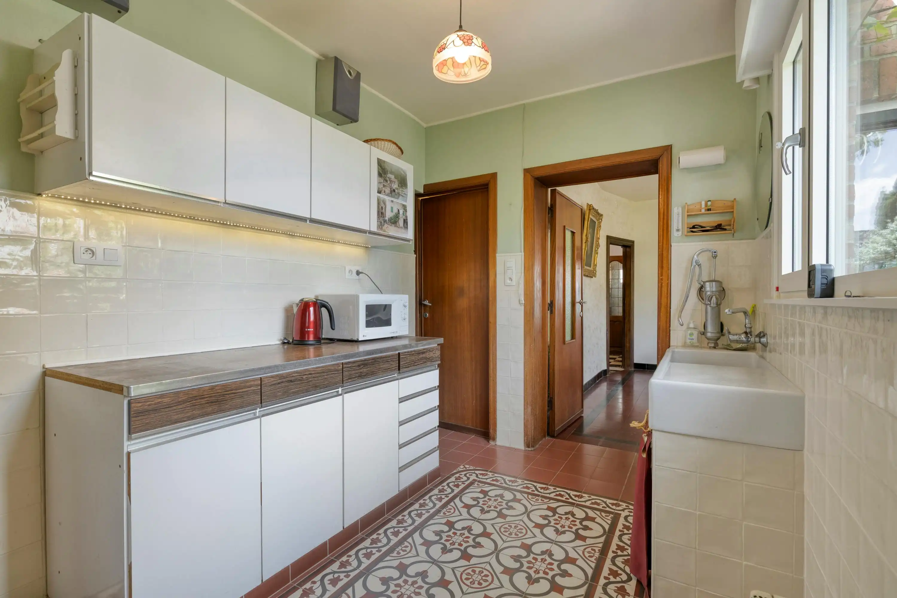 Halfopen huis met 3 slaapkamers, carport + tuin te Sint-Kruis foto 9