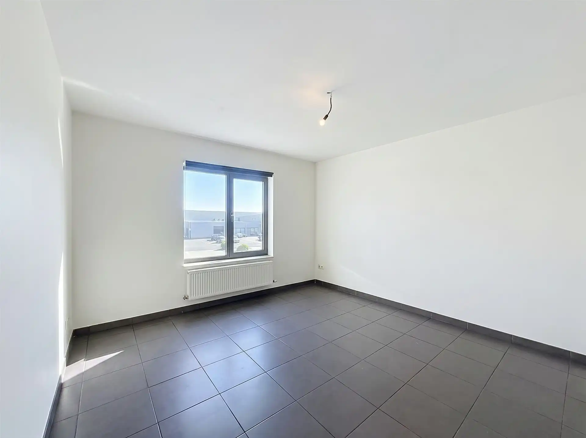 Recent en ruim 2-slaapkamer appartement met staanplaats nabij centrum Sint-Pauwels! foto 10