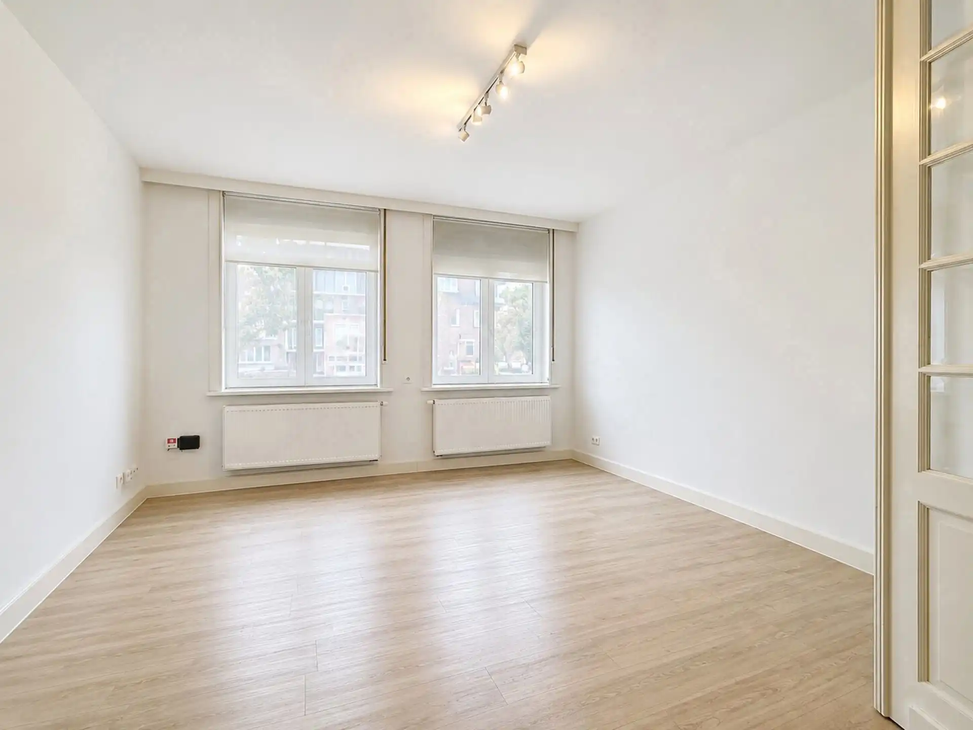 Luxe gelijkvloersappartement met stadstuin en garage box foto 4