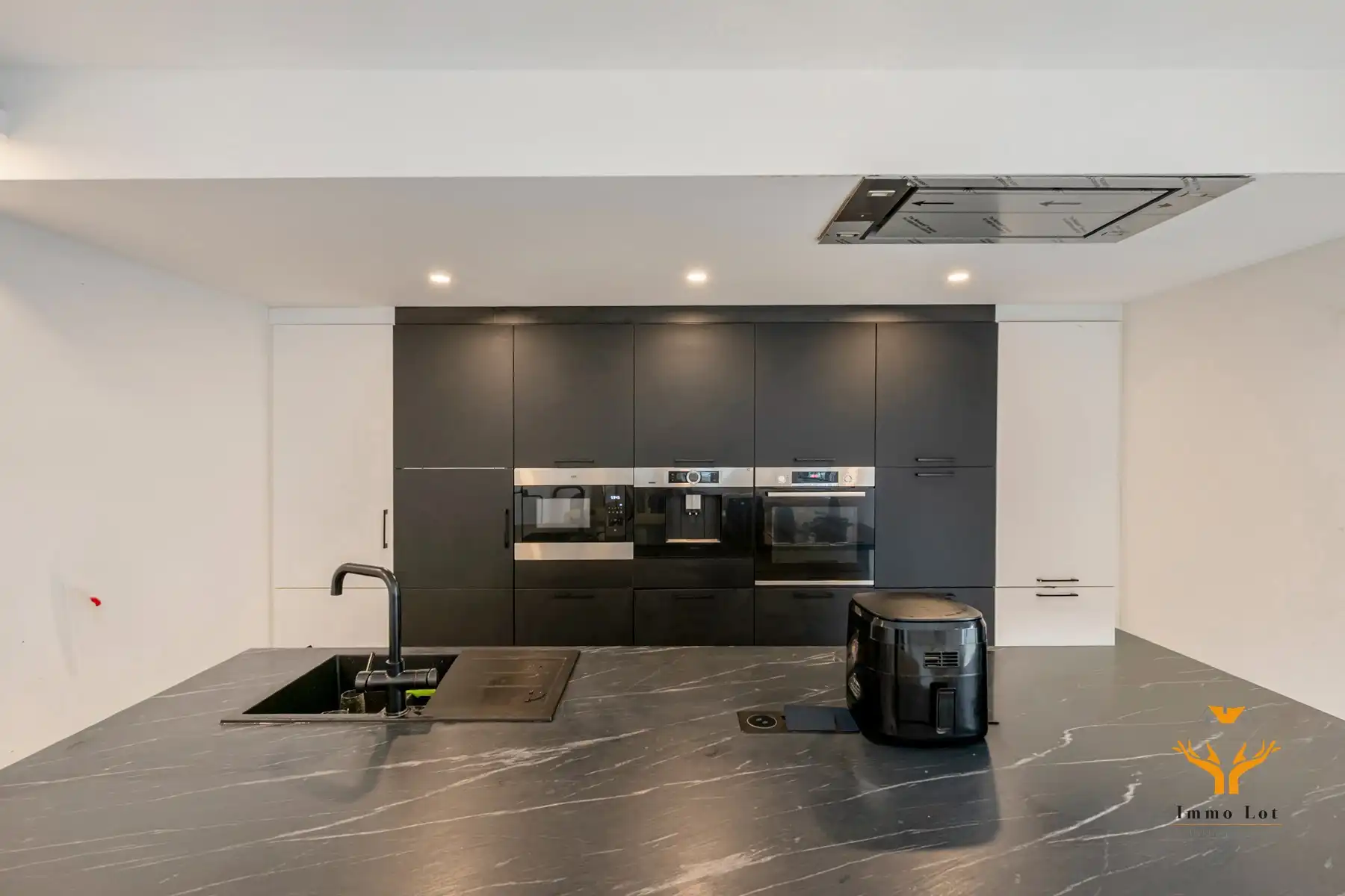 Woning met toonzaal, magazijn en garages te Hamme foto 19