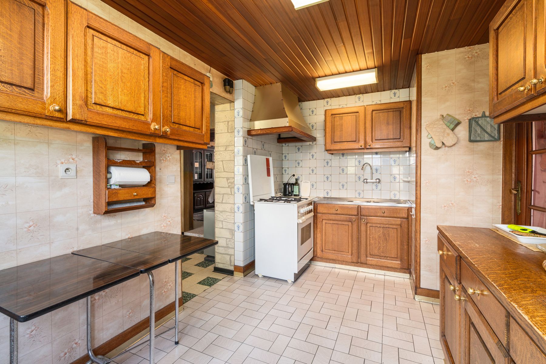 Te renoveren woning met 4 slaapkamers en mooie tuin in het rustige Haaltert foto 8