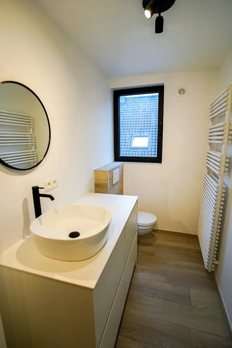 Energiezuinig duplex app met 1 slaapkamer + lift te Mechelen foto 9