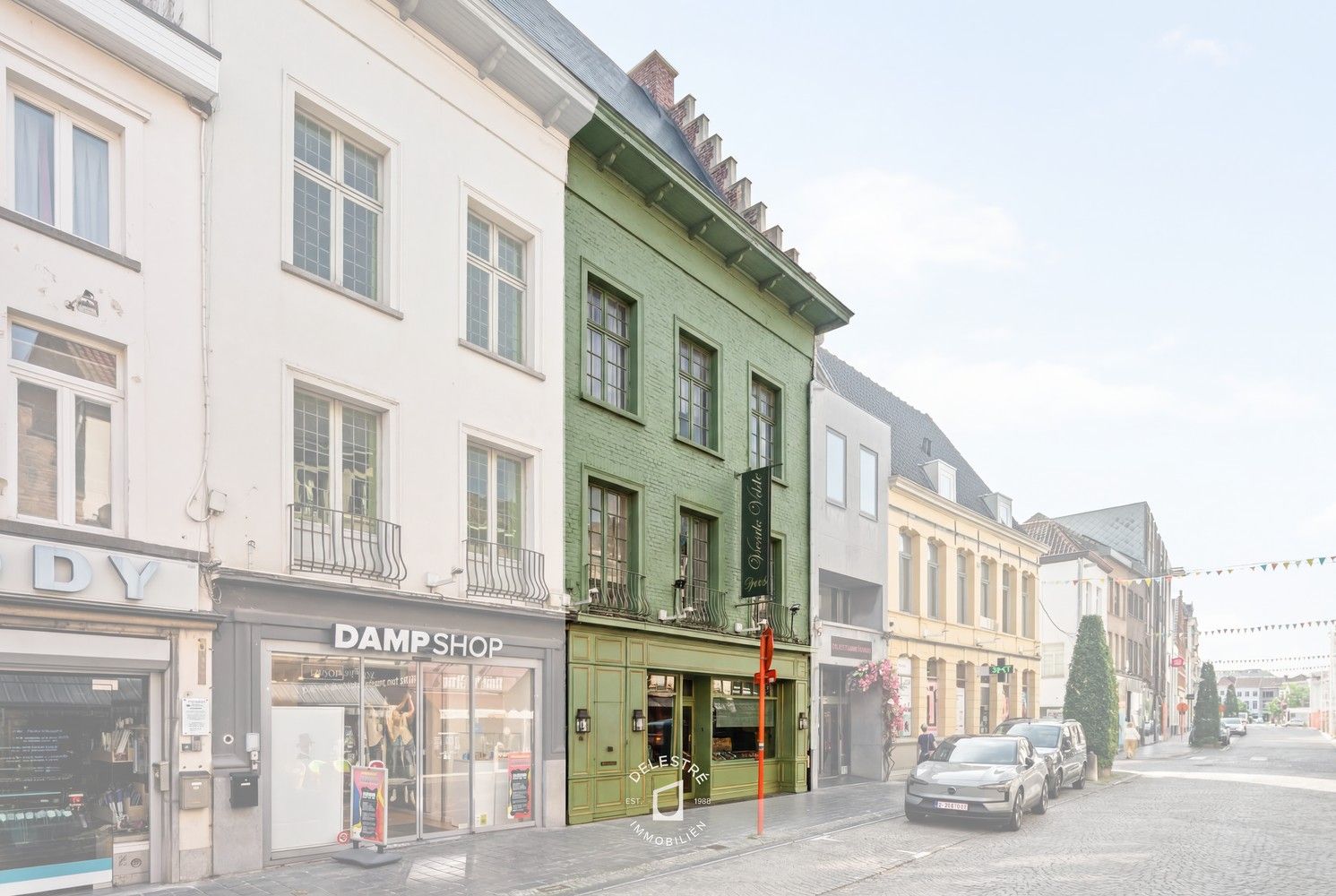 Karaktervol beschermd handelshuis op toplocatie in het hart van Oudenaarde