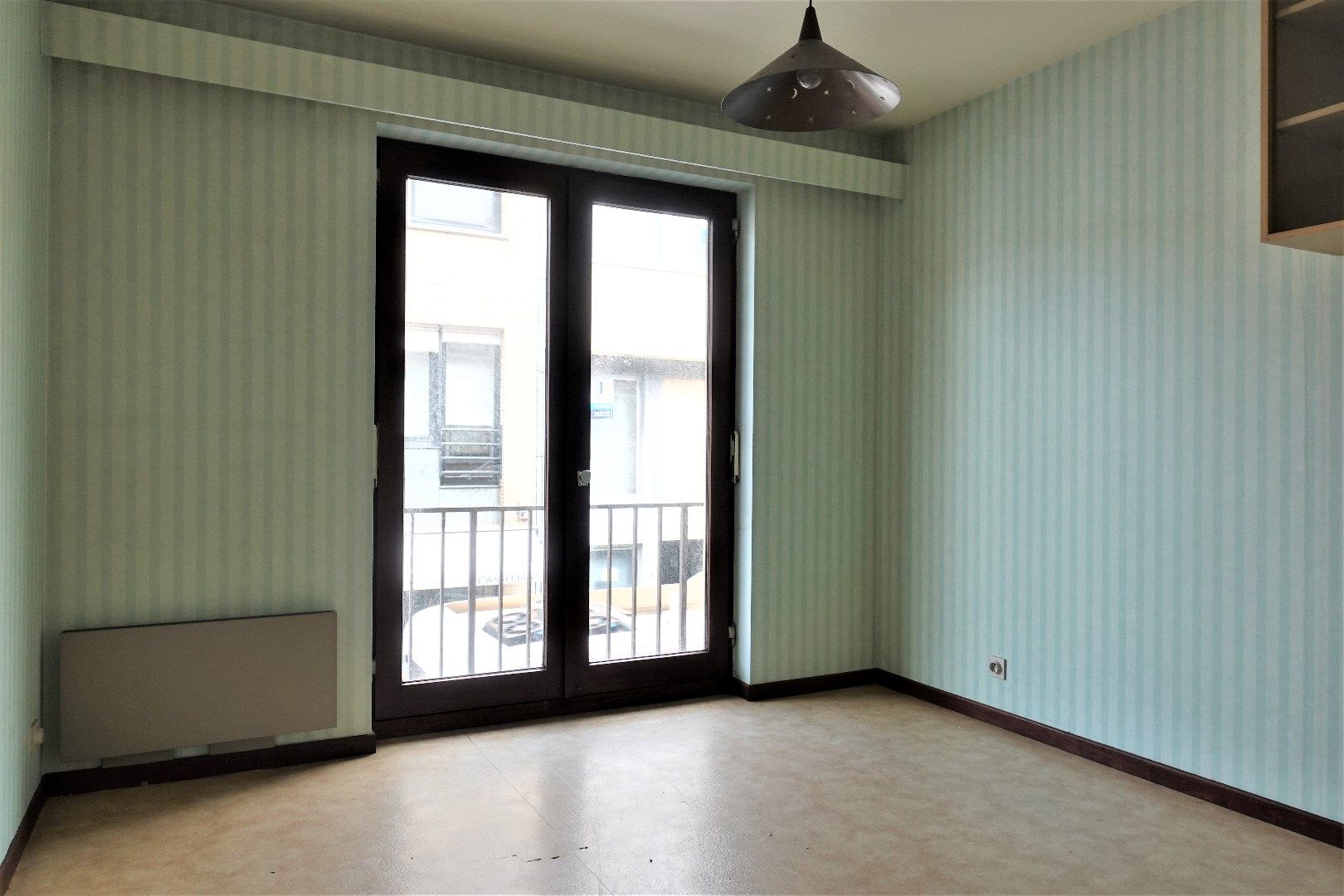 Opbrengsteigendom met 7 appartementen, 2 handelspanden en 7 garageboxen in Gistel foto 11