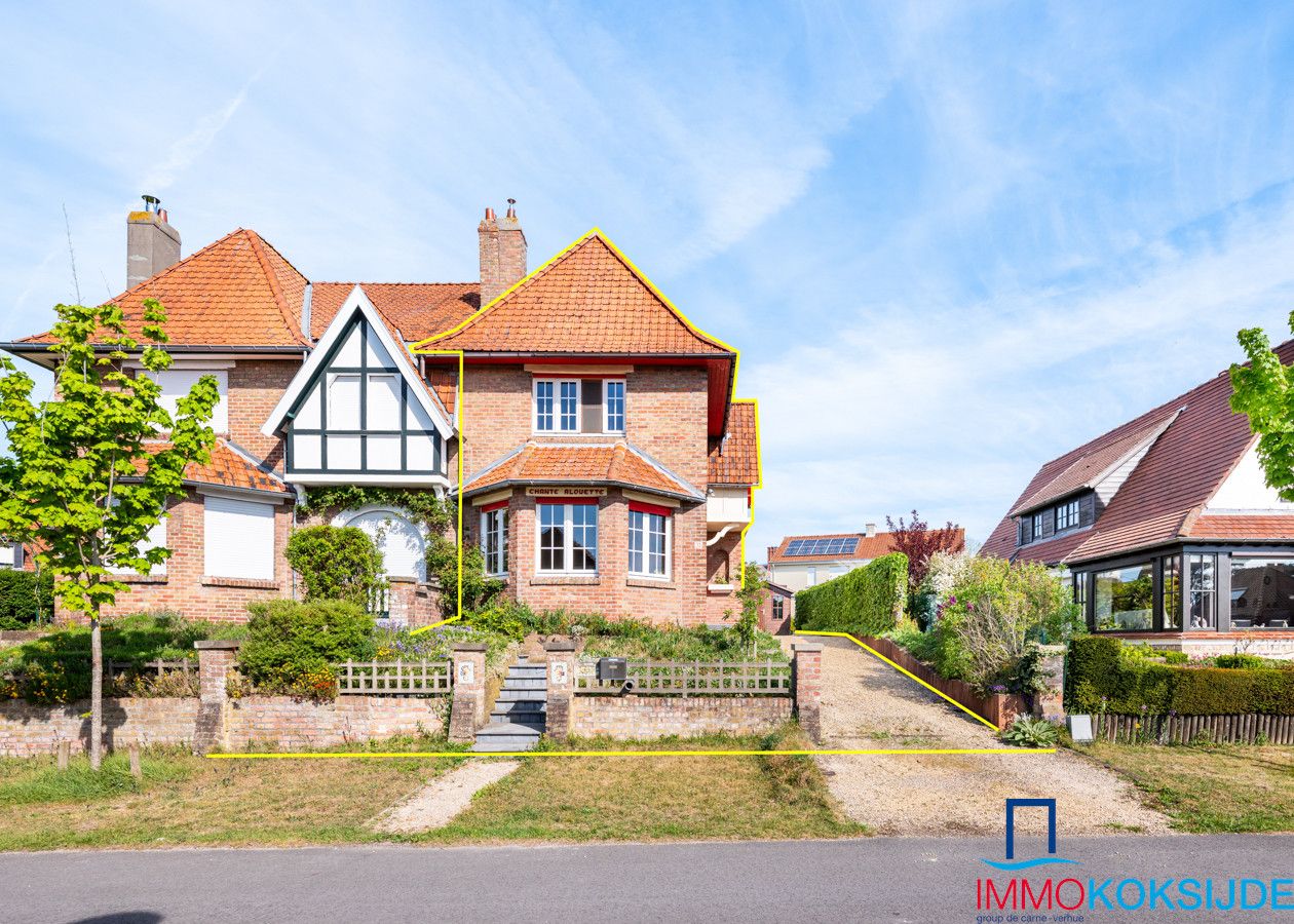 Rustig gelegen koppelwoning met 4 slaapkamers en zonnige tuin foto {{pictureIndex}}
