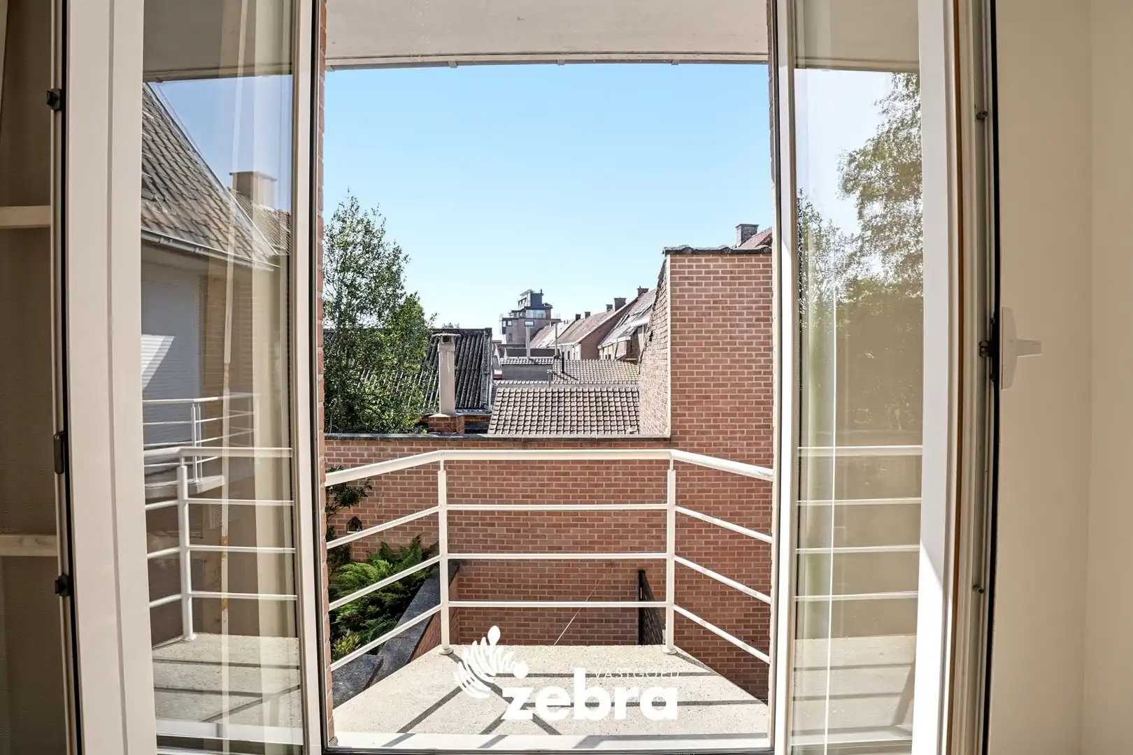 Zeer ruim appartement (137 m²) te koop met dubbele garage in het hartje van Tielt! foto 21