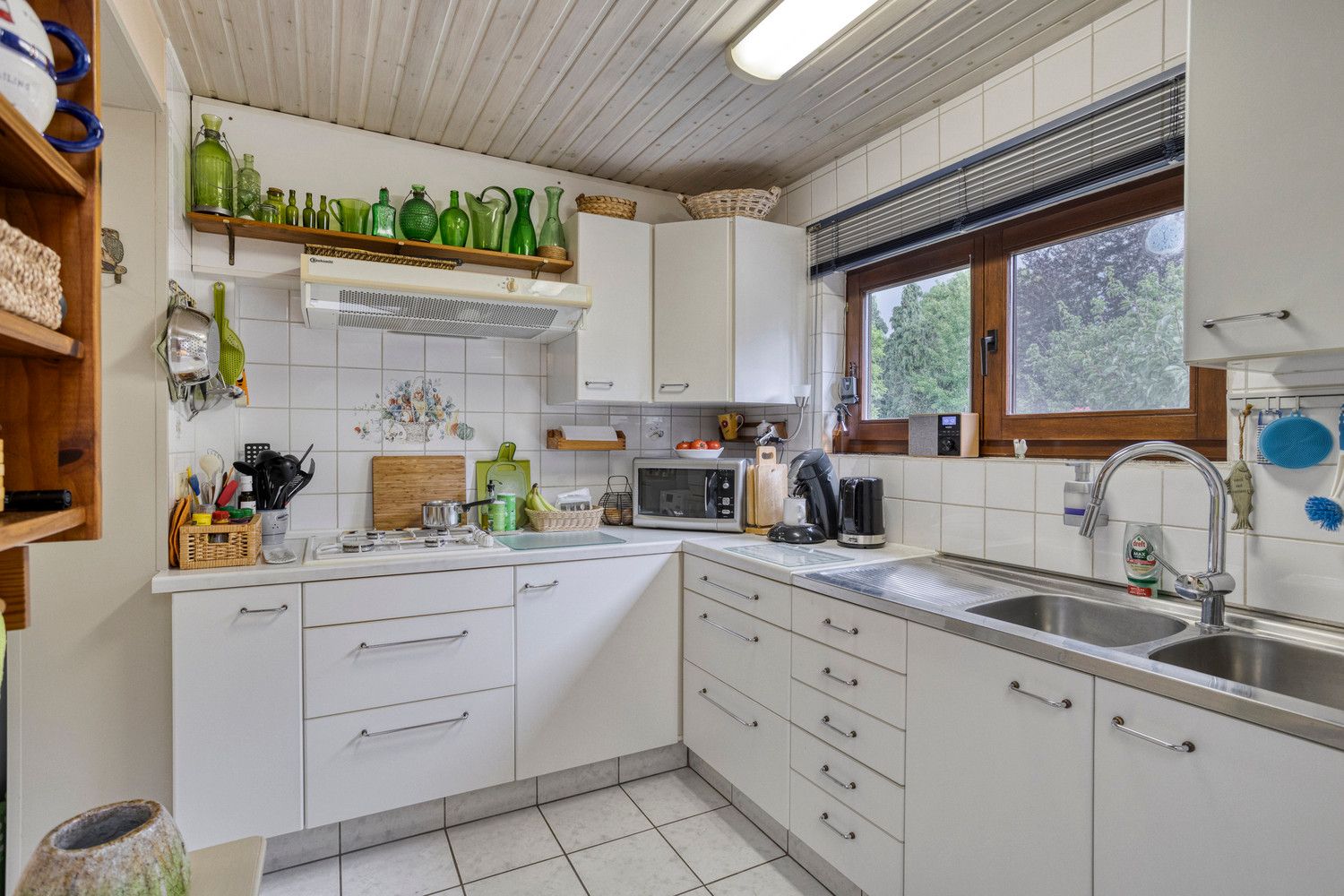 Vlakbij Boekenberg Park gelegen bel-étagewoning met 3 slks, tuin en garage. foto 18