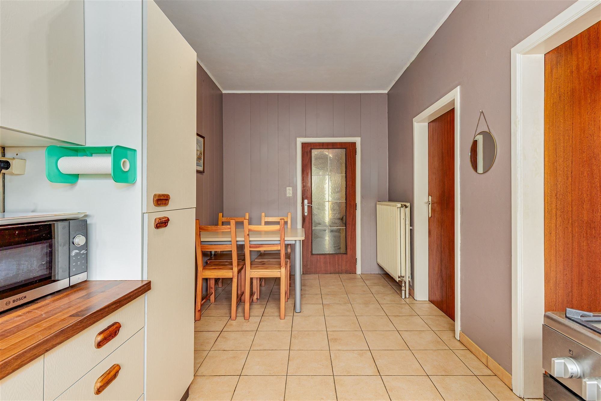 Te renoveren woning met 3 slpk, terras en ruime tuin in Wommelgem! foto 6