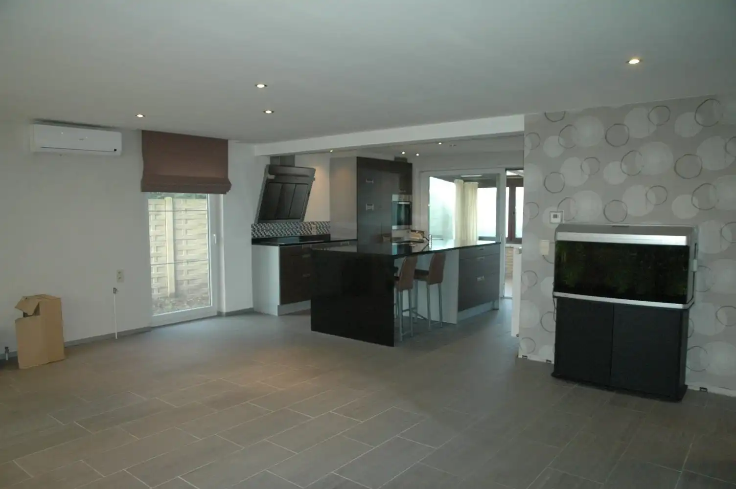 Degelijke gezinswoning met achterliggende loods/garage. foto 2