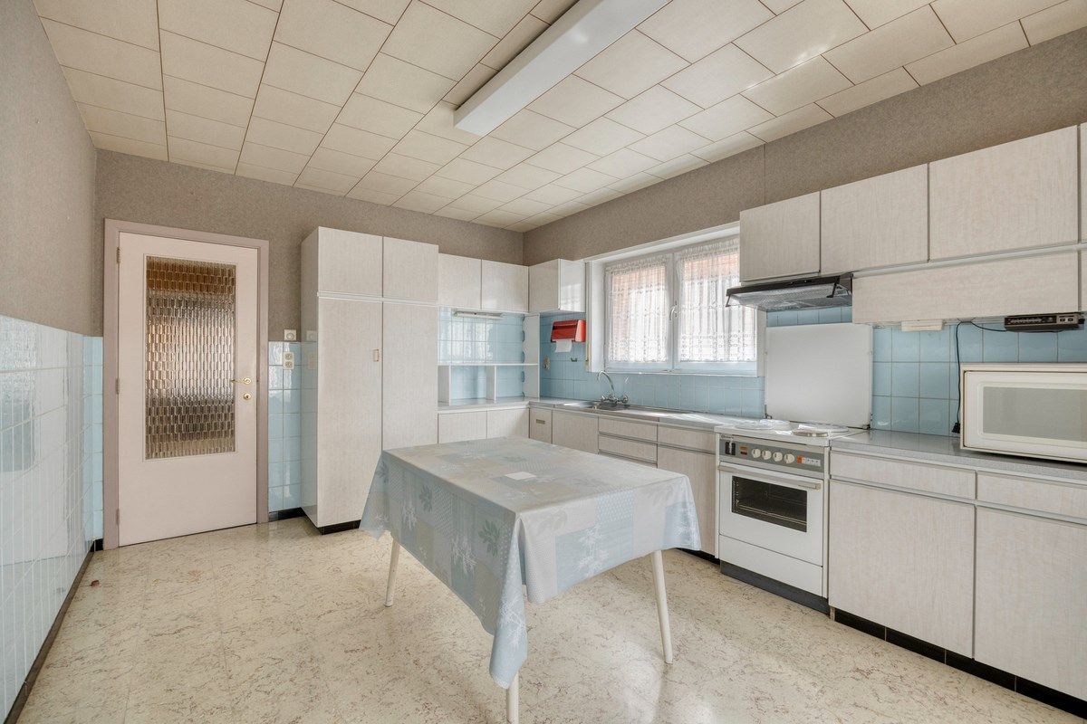 Ruime woning met tuin en 6 slaapkamers foto 9