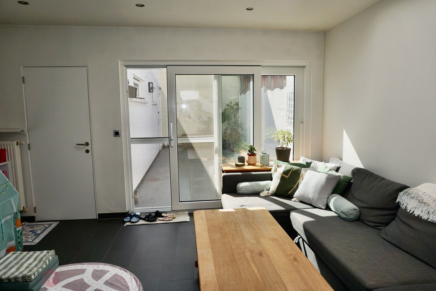 Gezellige rijwoning met 3 slaapkamers en tuin binnen de ring van Leuven. foto 3