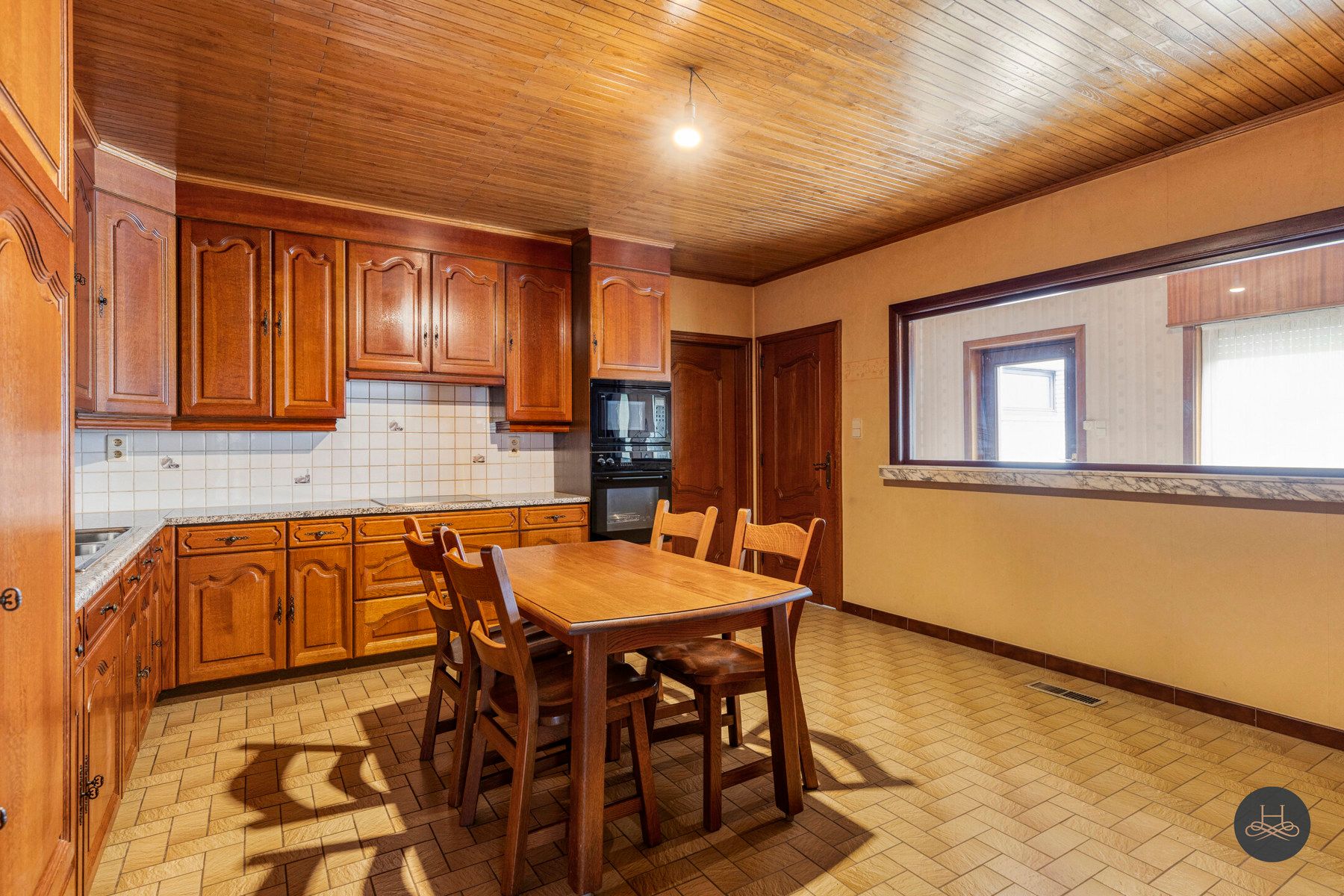 Gelijkvloerse woning met grote tuin foto 9
