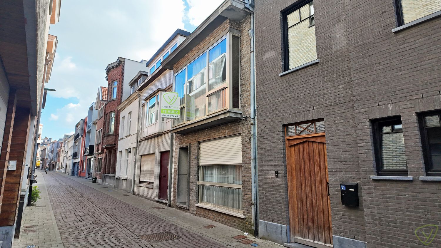Ruime en zonnige stadswoning met tuin in het centrum van Eeklo! foto 25