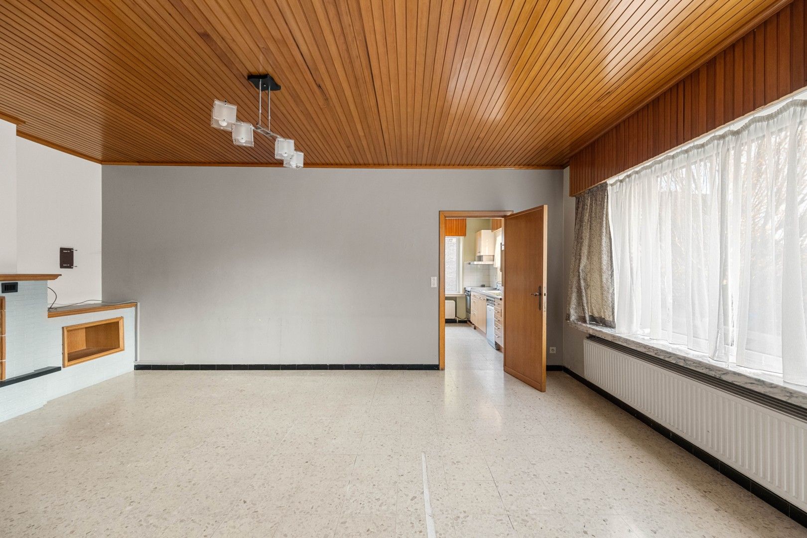 Halfopen gezinswoning in het hart van het landelijke Gontrode, met zicht op agrarisch gebied foto 7