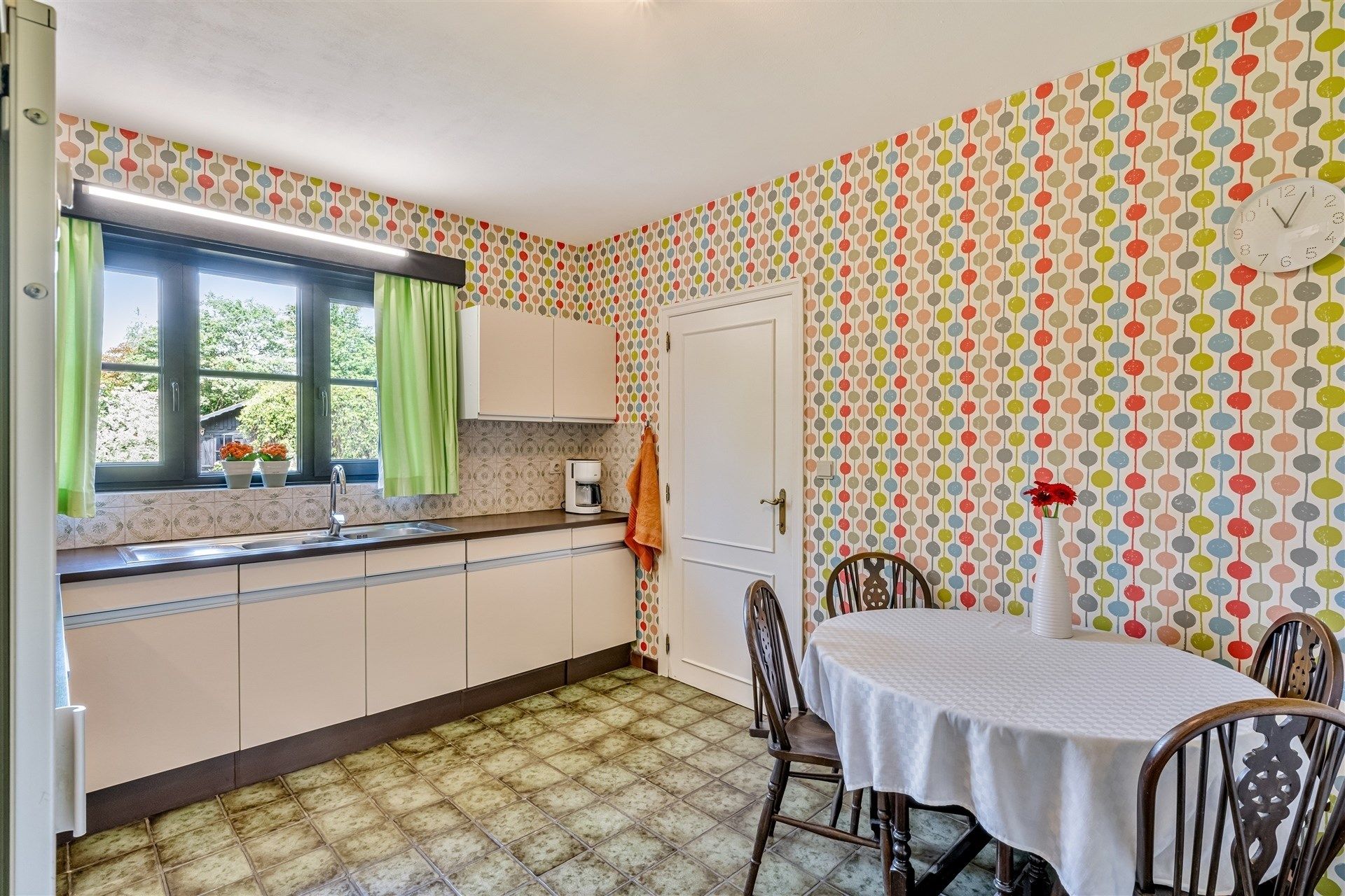 Topper! Instapklare woning in residentiële buurt, met zonnige tuin! foto 12