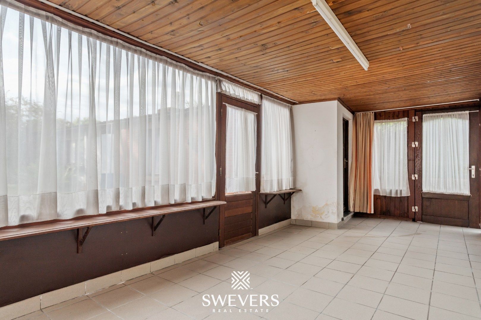 Te renoveren woning met veel potentieel op toplocatie te Diepenbeek foto 12