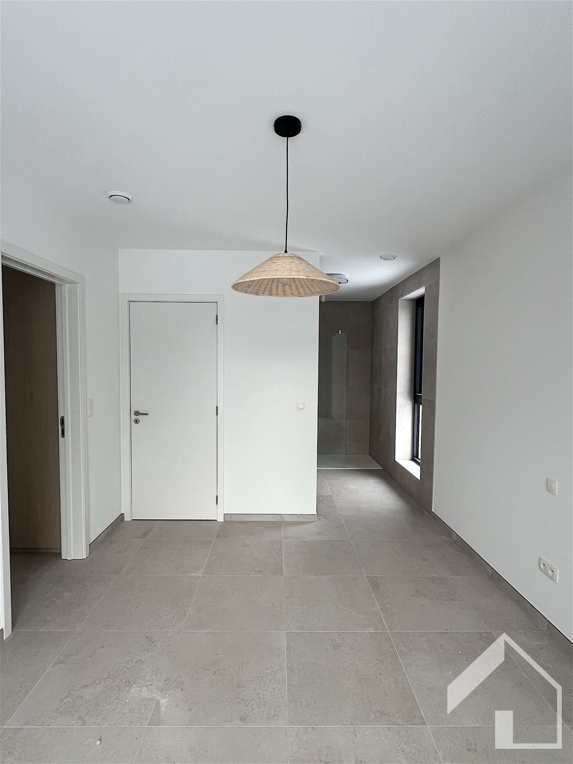 Nieuwbouwappartement met staanplaats en kelderberging foto 8