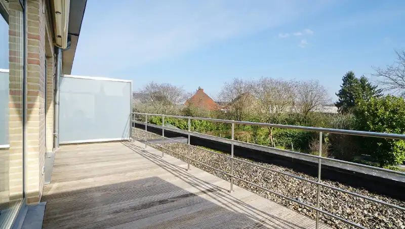 Ruim 3 slaapkamer appartement van 130m² met terras 14m² op zuid-oosten foto {{pictureIndex}}