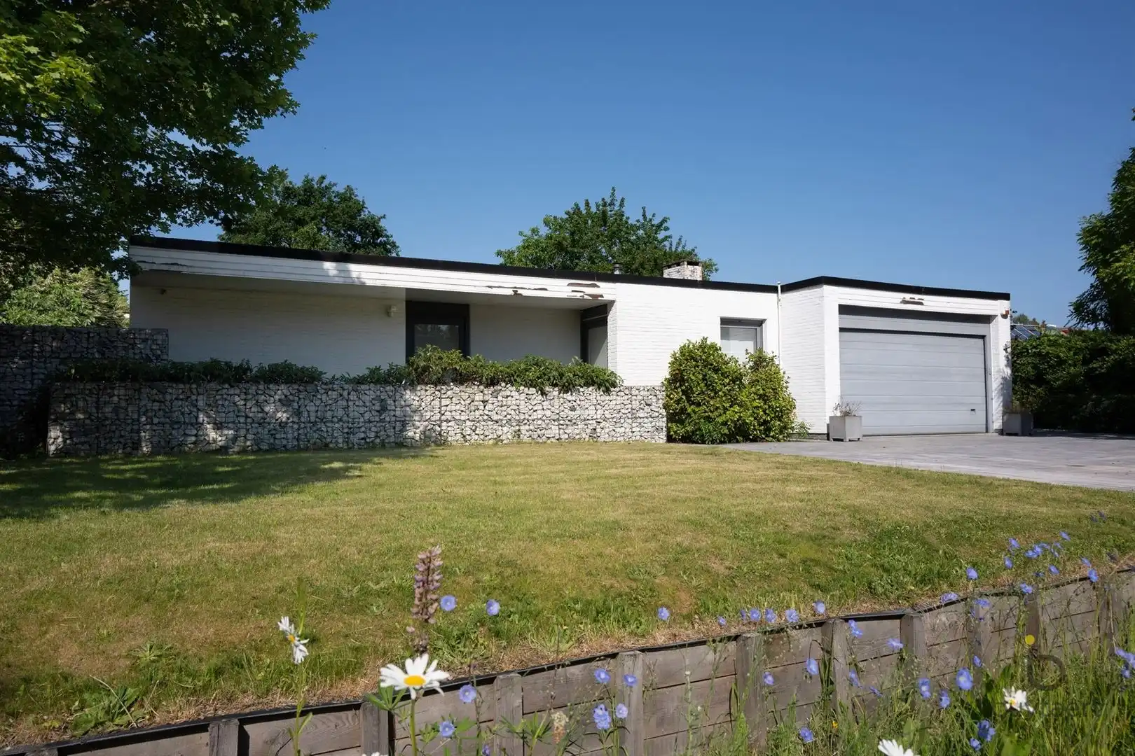 Te renoveren zonovergoten gelijkvloers 70’s woning met prachtige tuin en tal van mogelijkheden! foto 57