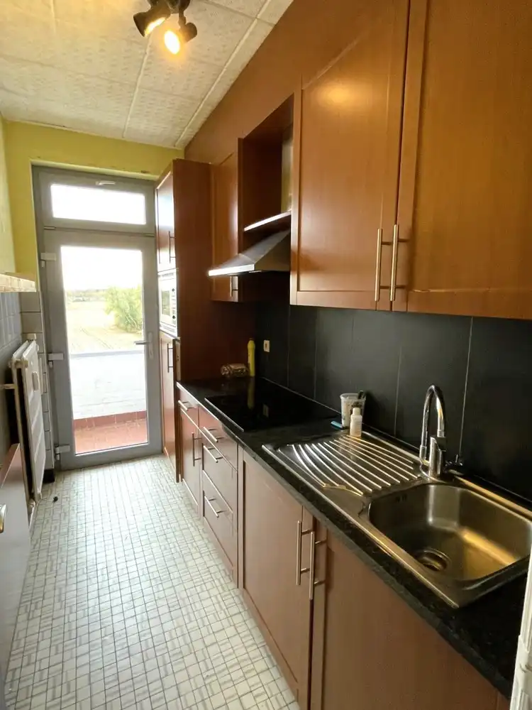 Lichtrijk appartement met zuidgericht terras, staanplaats en uitstekende ligging nabij UZ Leuven foto 3