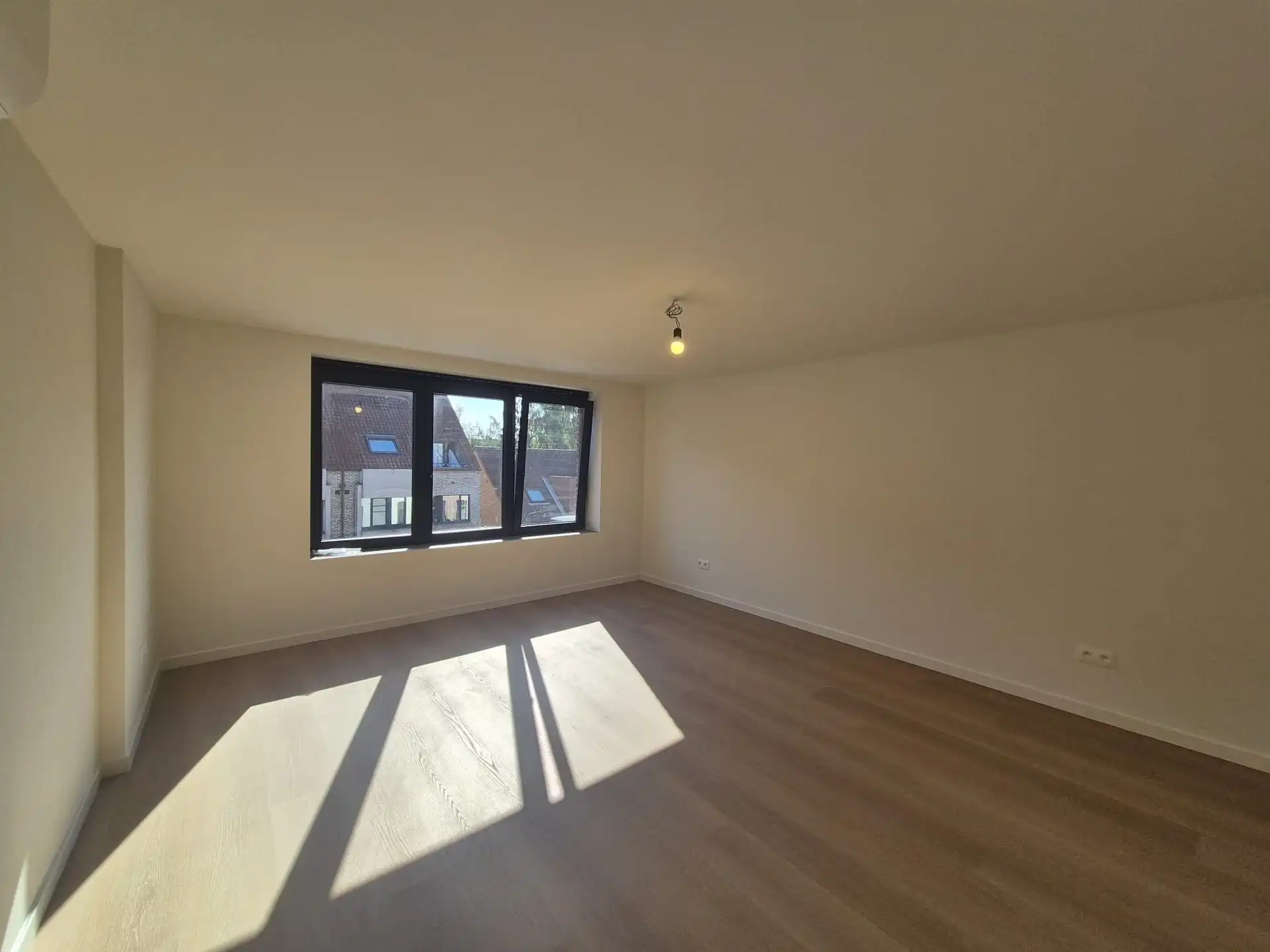 Ruim triplex appartement met polyvalente ruimte op toplocatie in het hart van Wetteren foto 17