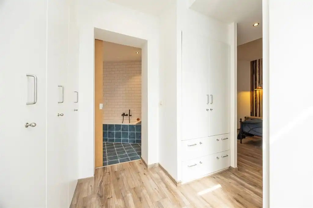 Unieke woning met eclectische gevels en dakterras foto 18