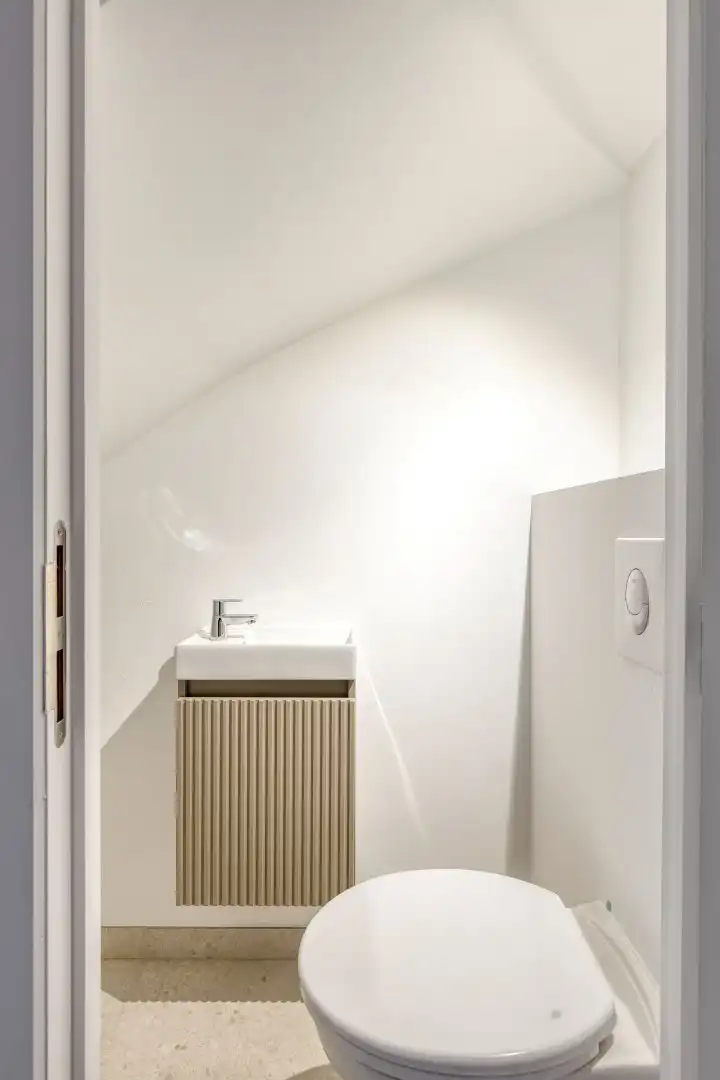 Volledig gerenoveerde studentenkamer in residentie met 15 studentenkamers en een 1slaapkamer appartement in hartje Leuven - EPC label A! foto 8