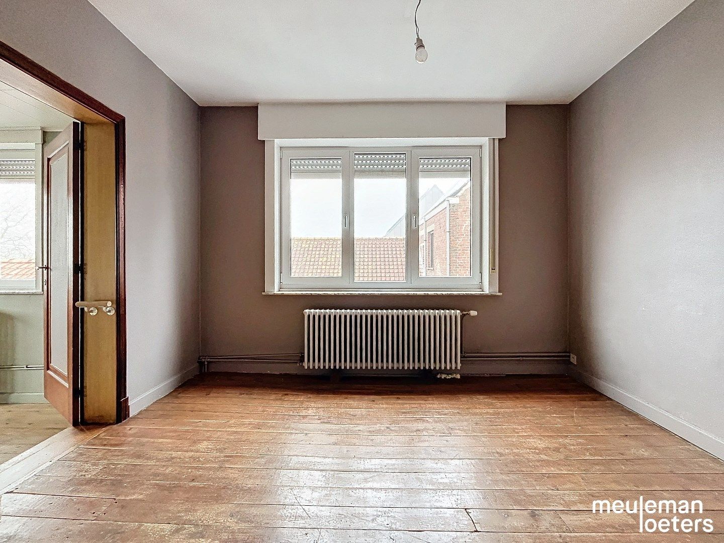 Karaktervolle ruime rijwoning met garage en tuin foto 12