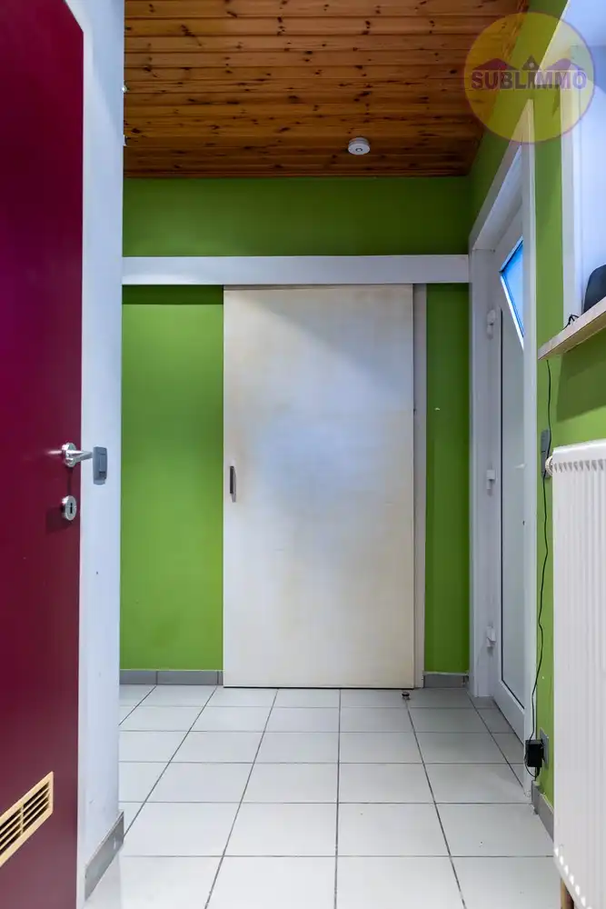 Handelspand met woonst + 4 garages in het centrum van Meerhout foto 3