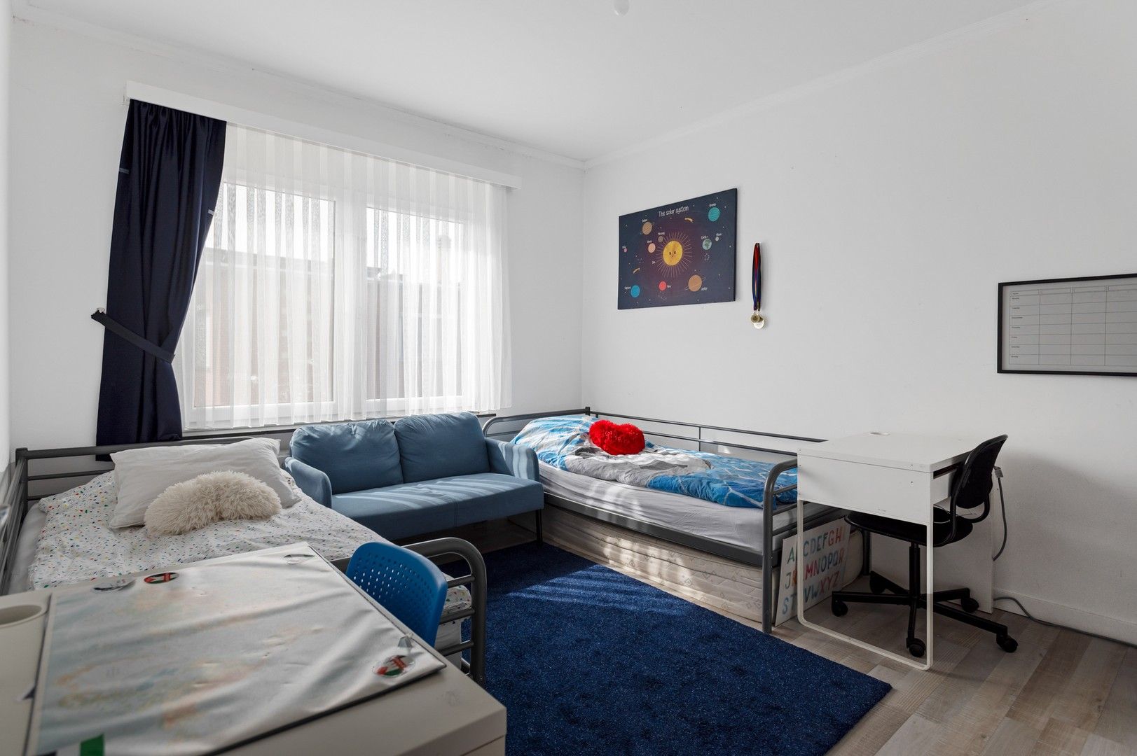 Ruime bel-étage met 4 slaapkamers en gezellige tuin foto 13