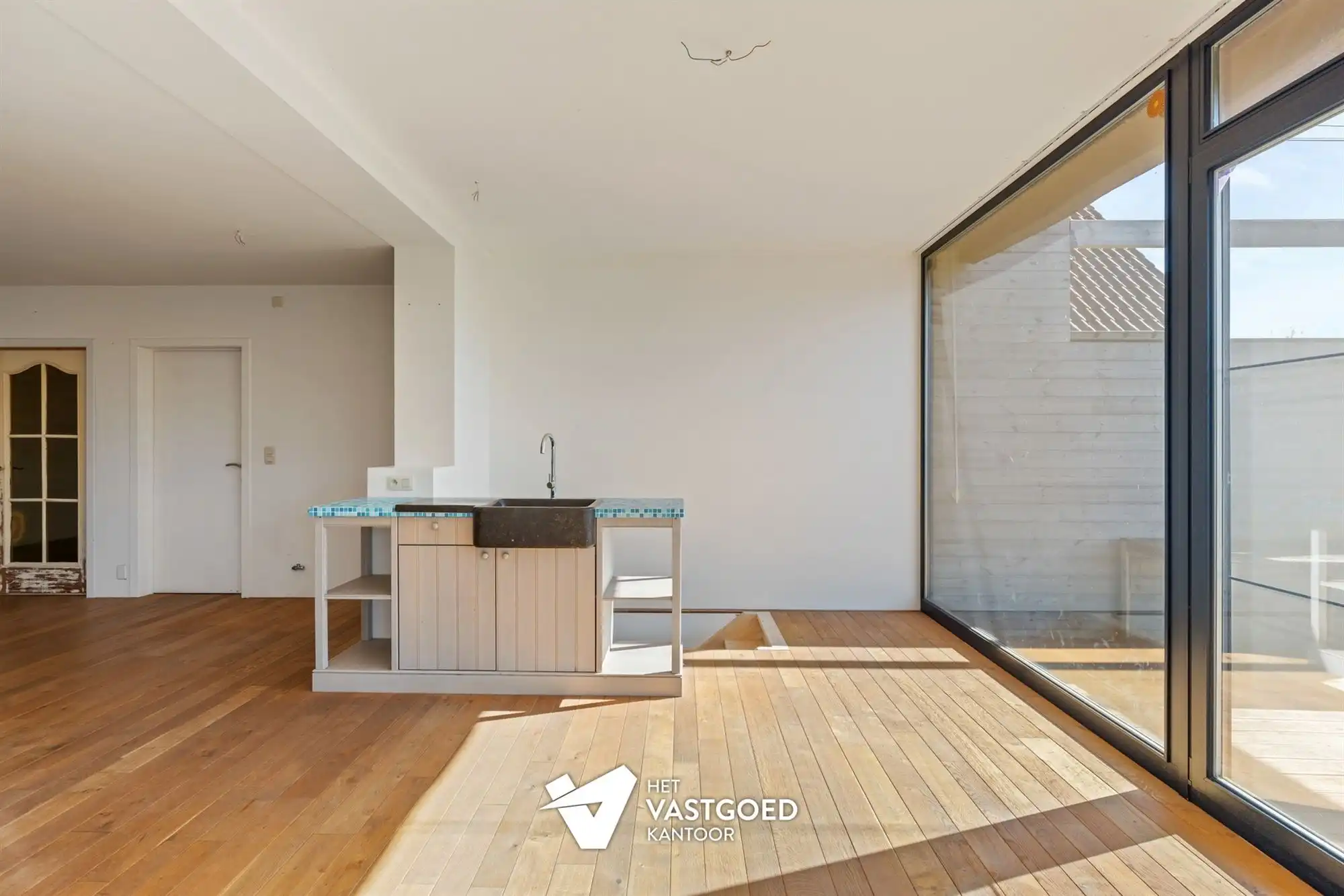 ZEER RUIME WONING MET TAL VAN MOGELIJKHEDEN OP BREED PERCEEL VAN 15 ARE TE KOERSEL foto 5