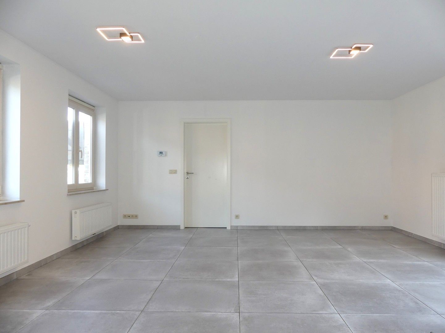 Halfopen nieuwbouwwoning met binnenterras, tuintje en garage - 3 slaapkamers foto 4