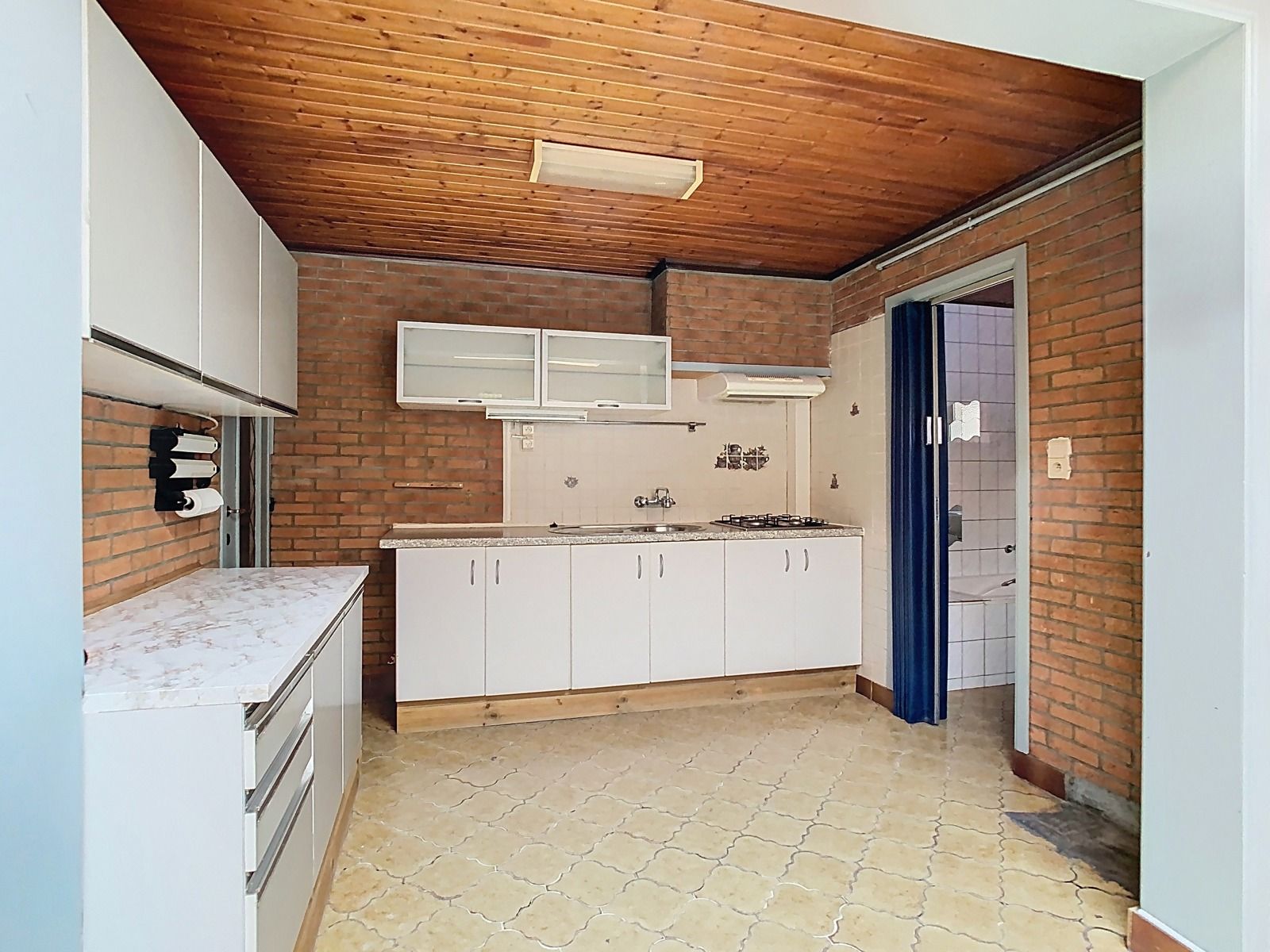 Mooie stadswoning met 2 SLPK,tuin en optionele garage! foto 8