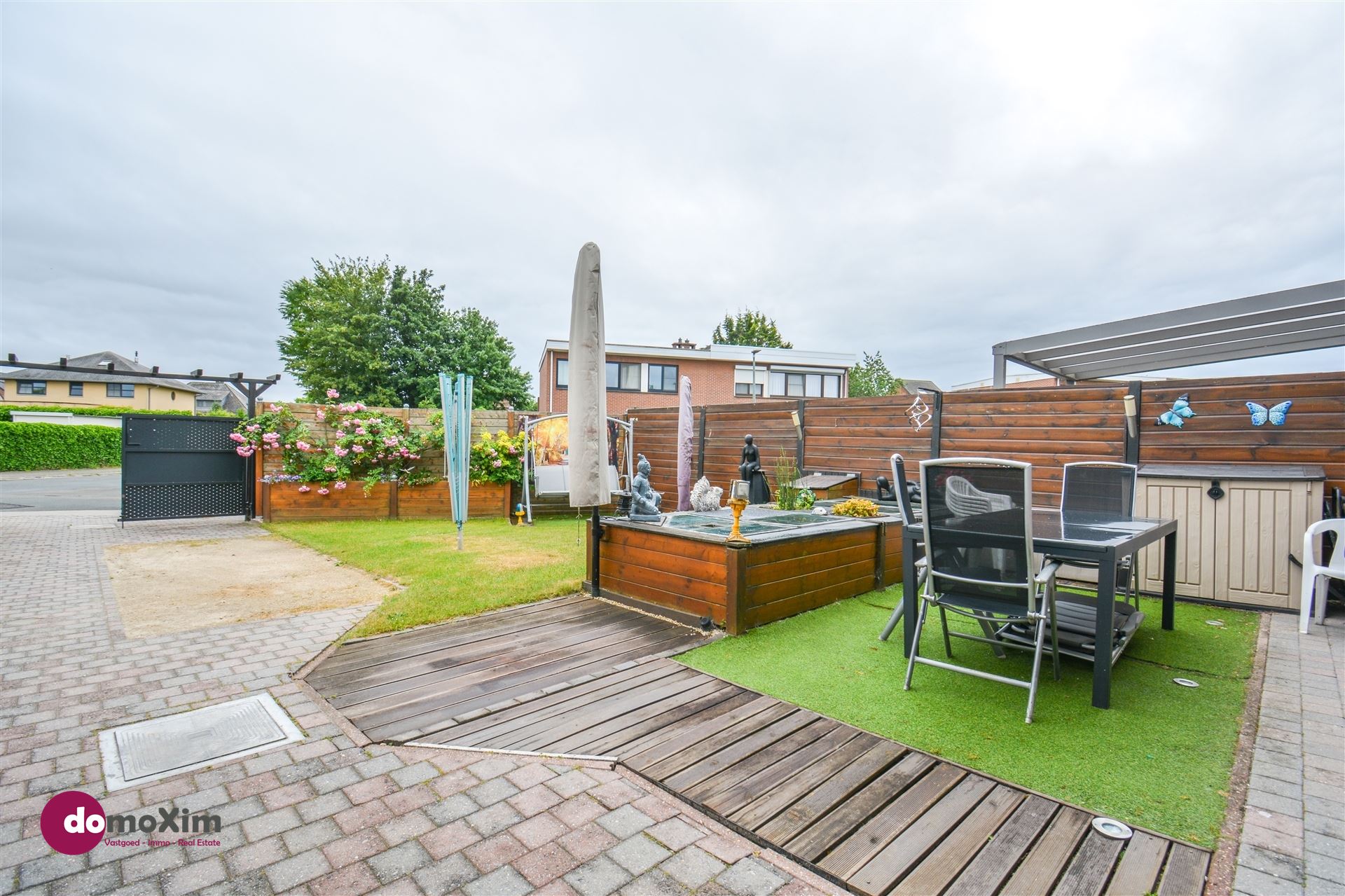 Aangename gezinswoning met zonnig terras en garage, op wandelafstand van winkels foto 2