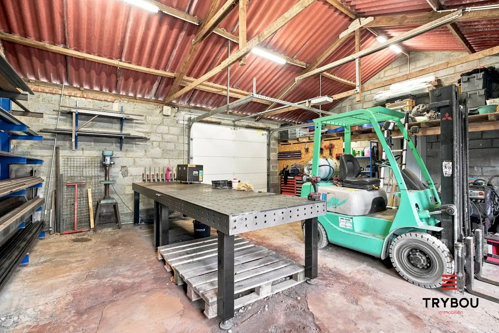 Uitstekende gelegen woning met loods en tuin!  foto 22
