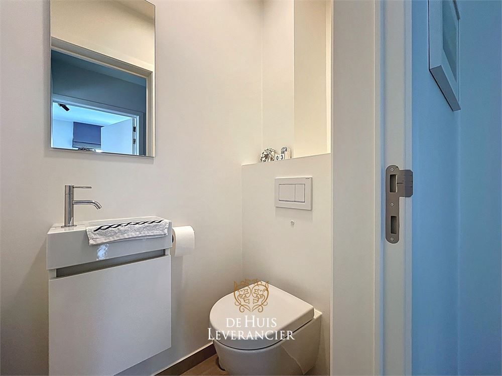 Discrete luxe & tijdloze elegantie : subliem nieuwbouwappartement met terras en gemeenschappelijk tuin te koop in Boechout foto 17