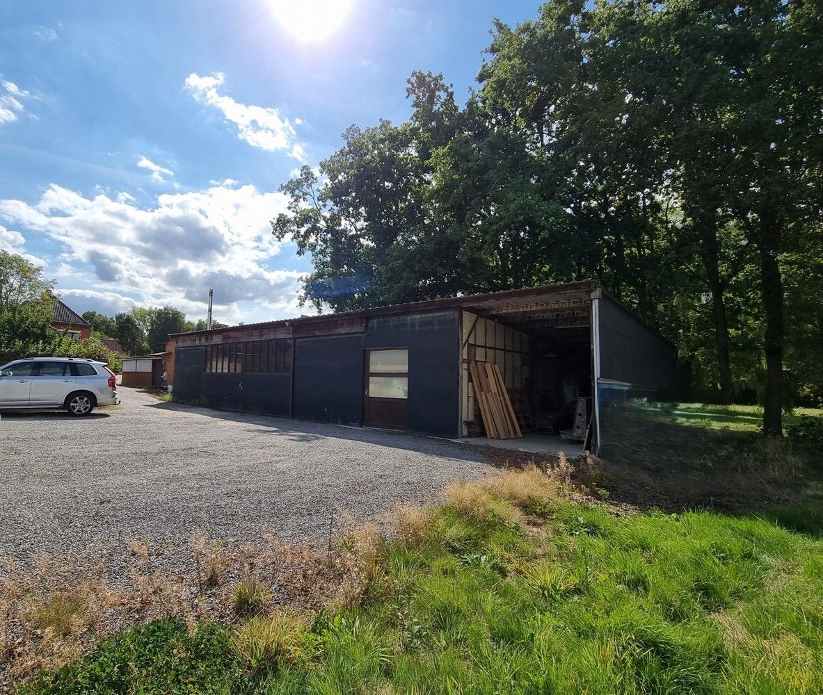 Woning met achterliggend magazijn op een totaal perceel van 19 are 58 ca. foto 7