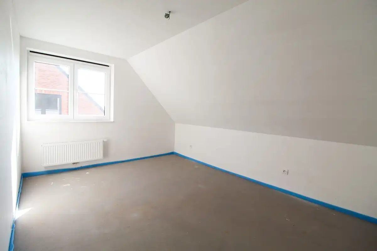 Halfopen nieuwbouwwoning met garage Roeselare foto 8