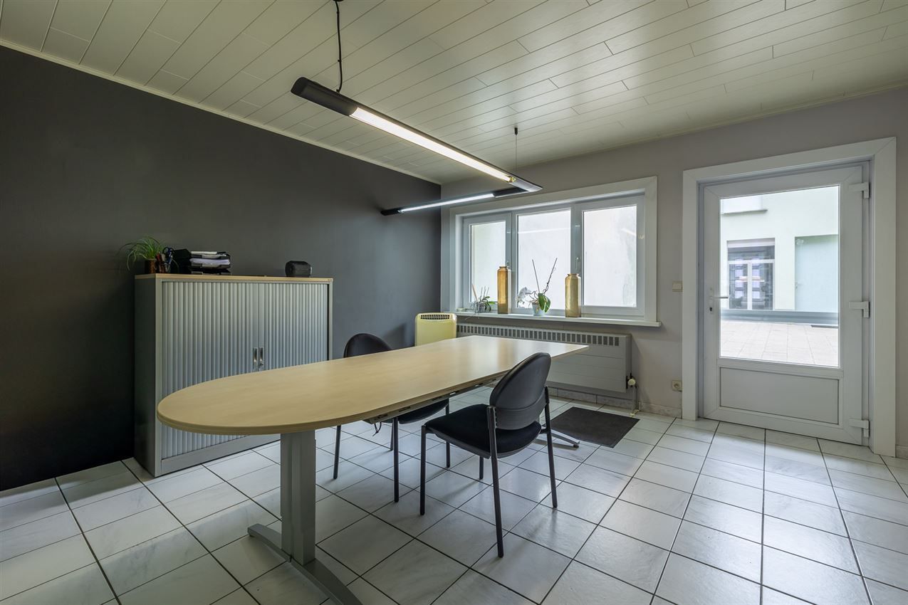 Verzorgd gebouw met handelszaak en 2 apt foto 49