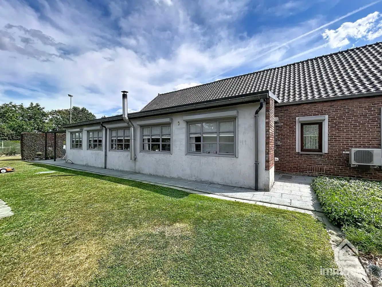 Ruime woning op bijna 2.000 m² grond met dubbele garage en werkhuis foto 47