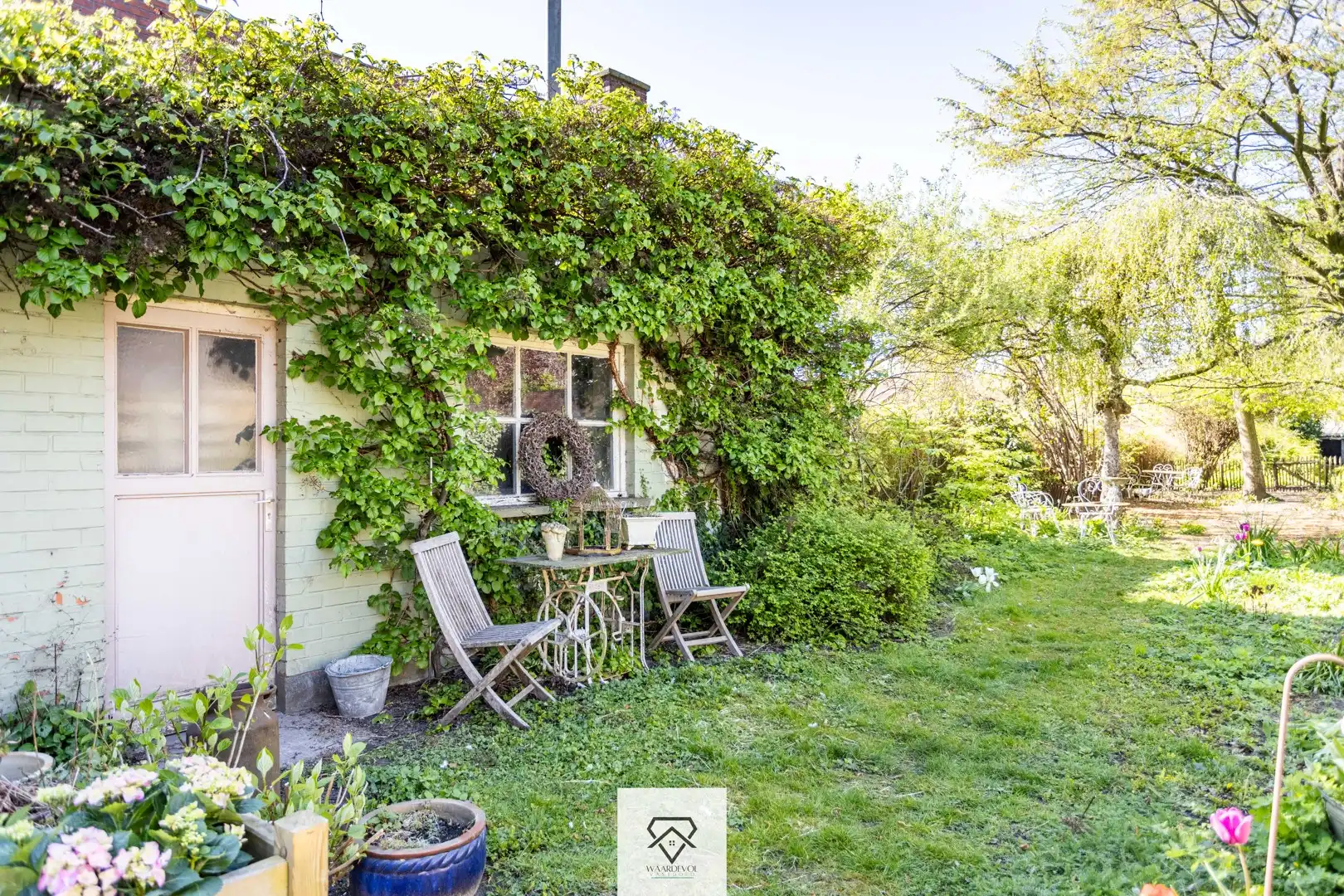Gezinswoning met tuin en veel potentieel in het gegeerde Oostakker foto 24