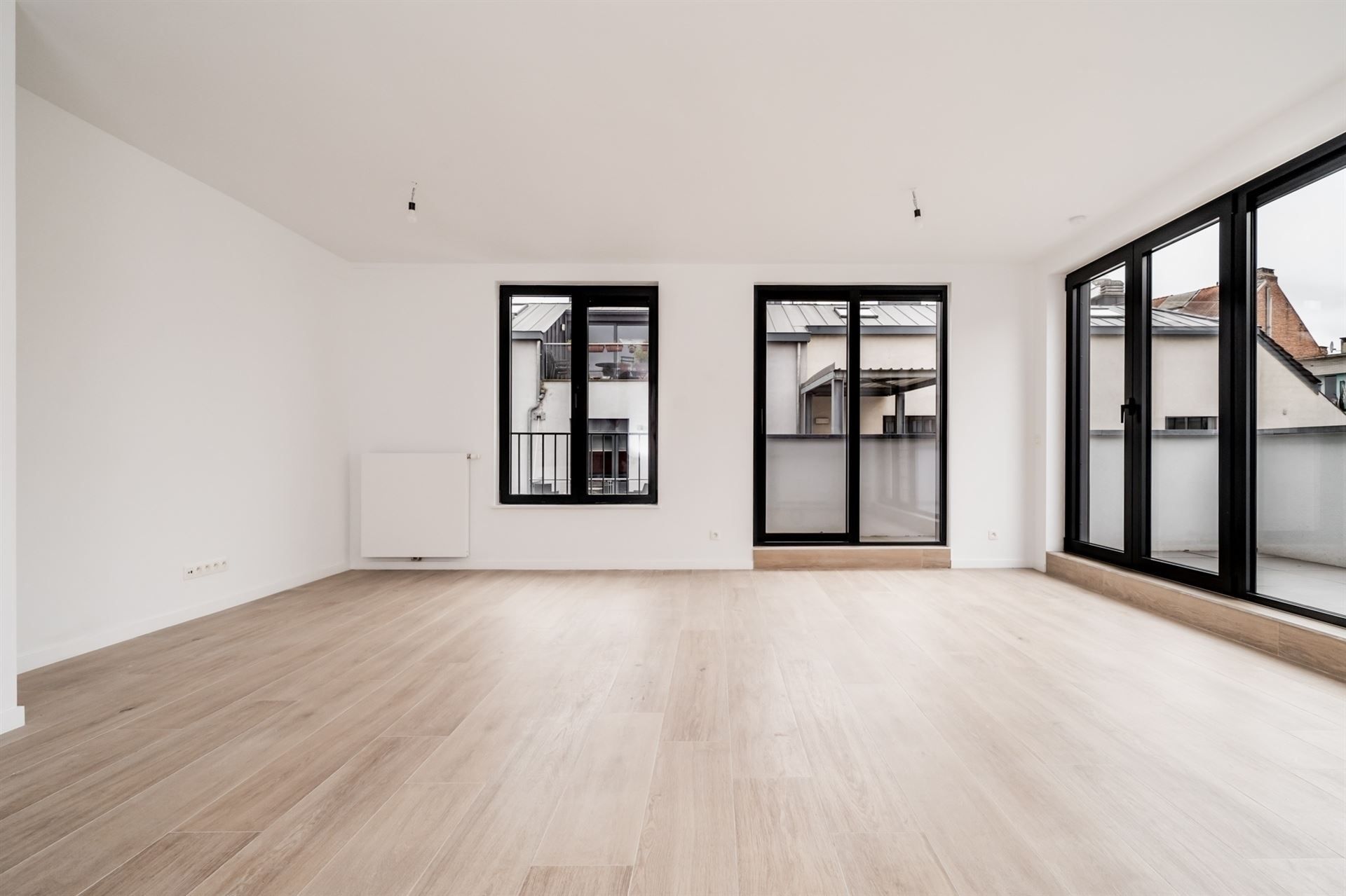 Dicht bij het Tour&Taxis-terrein, prachtig duplex penthouse met 3 slaapkamers foto 2