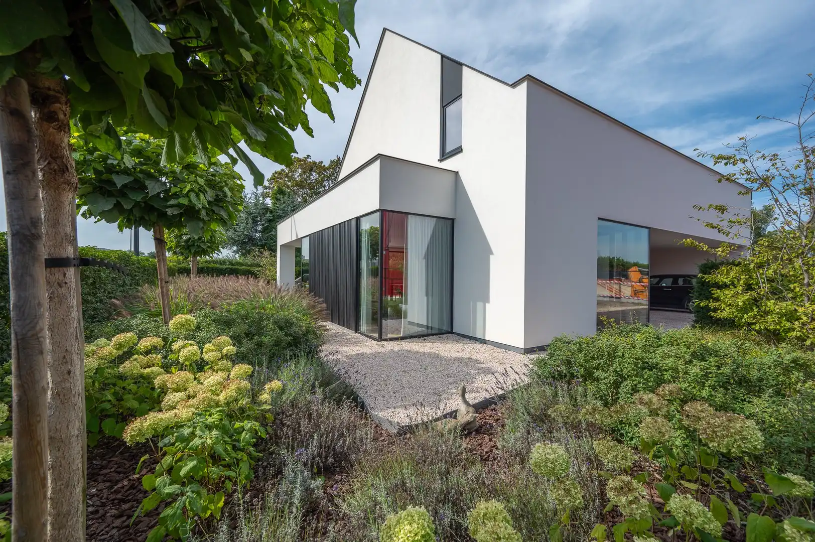 Prachtige hedendaagse villa met zonnige tuin en terrassen op fietsafstand van de zee. foto 3
