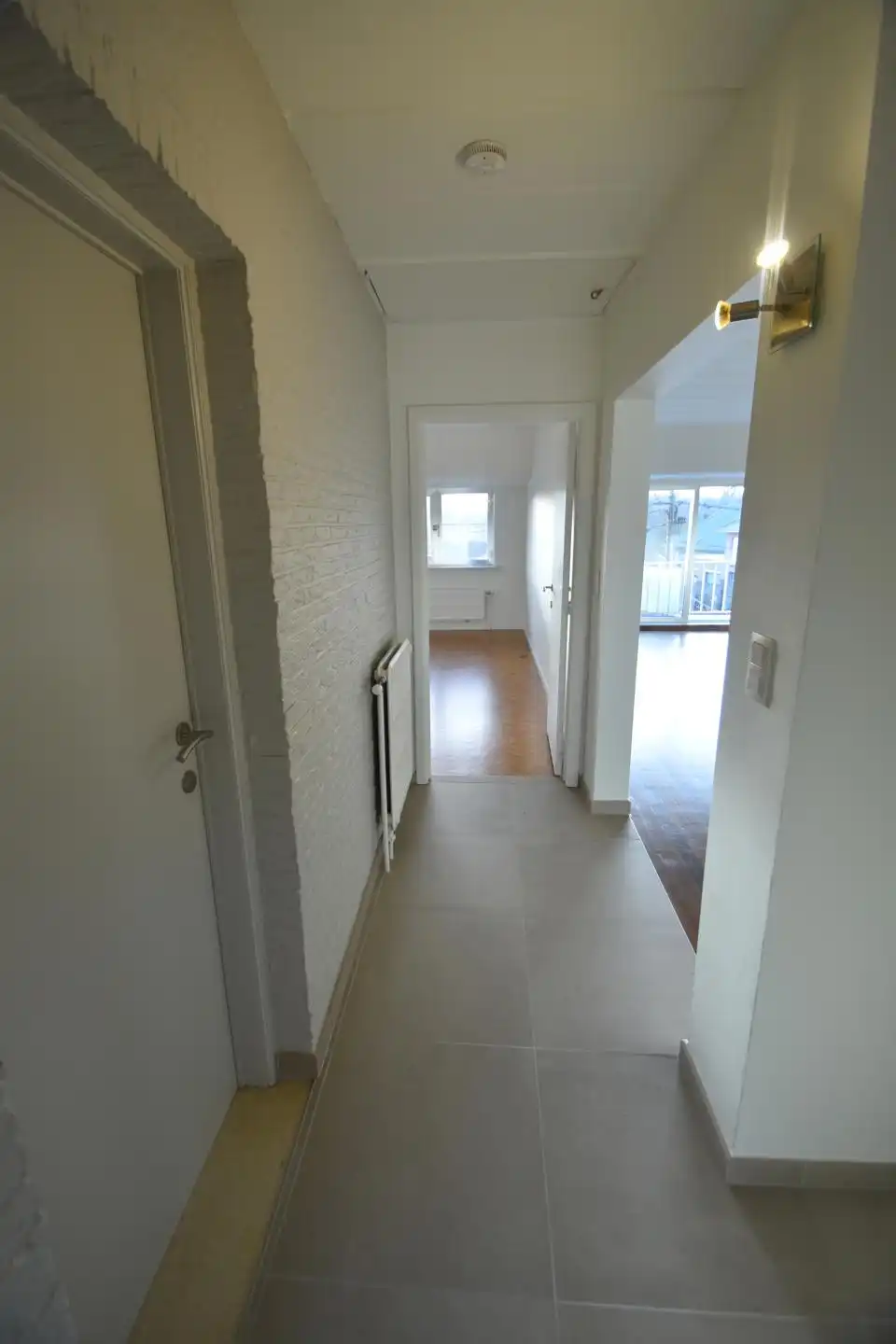 Gerenoveerd 2-slaapkamerappartement met terras (6,5 m²) en balkon,  bergzolder, autostaanplaats en private berging 6,5 m² en 16 m² foto 19