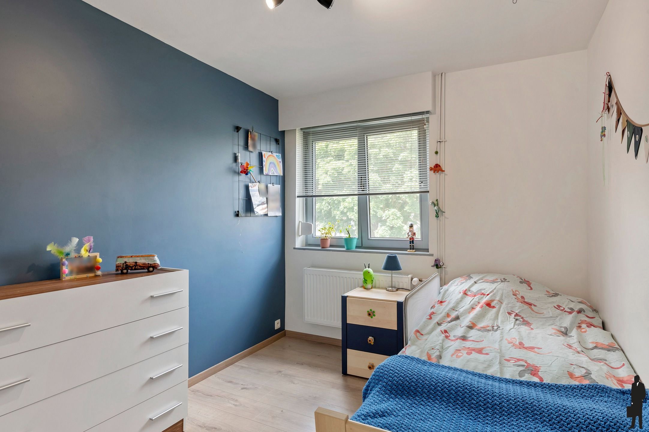 Instapklare gezinswoning met garage in een rustige straat ! foto 13