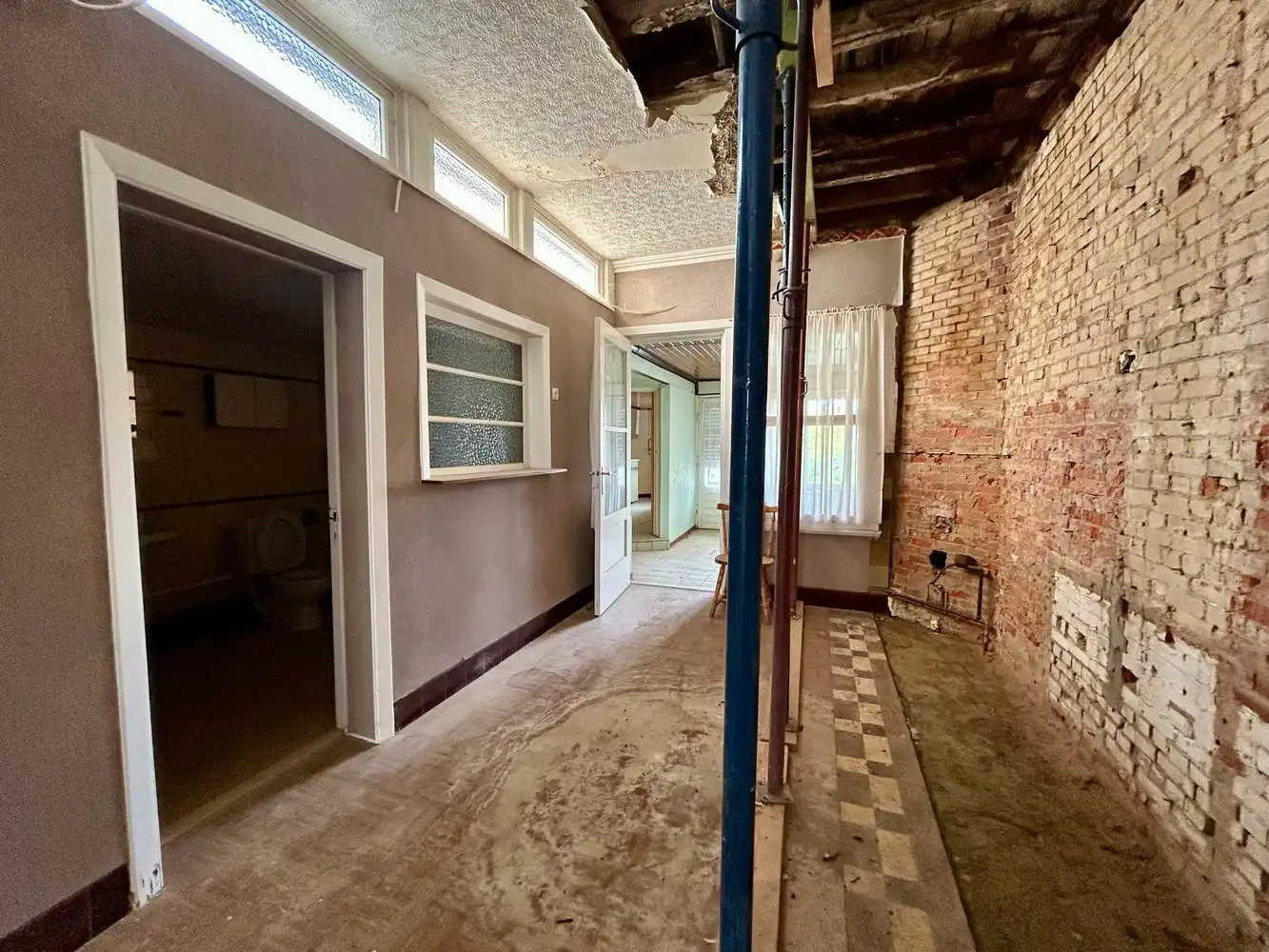 Volledig te renoveren rijwoning met veel potentieel op toplocatie in Kessel-Lo foto 6