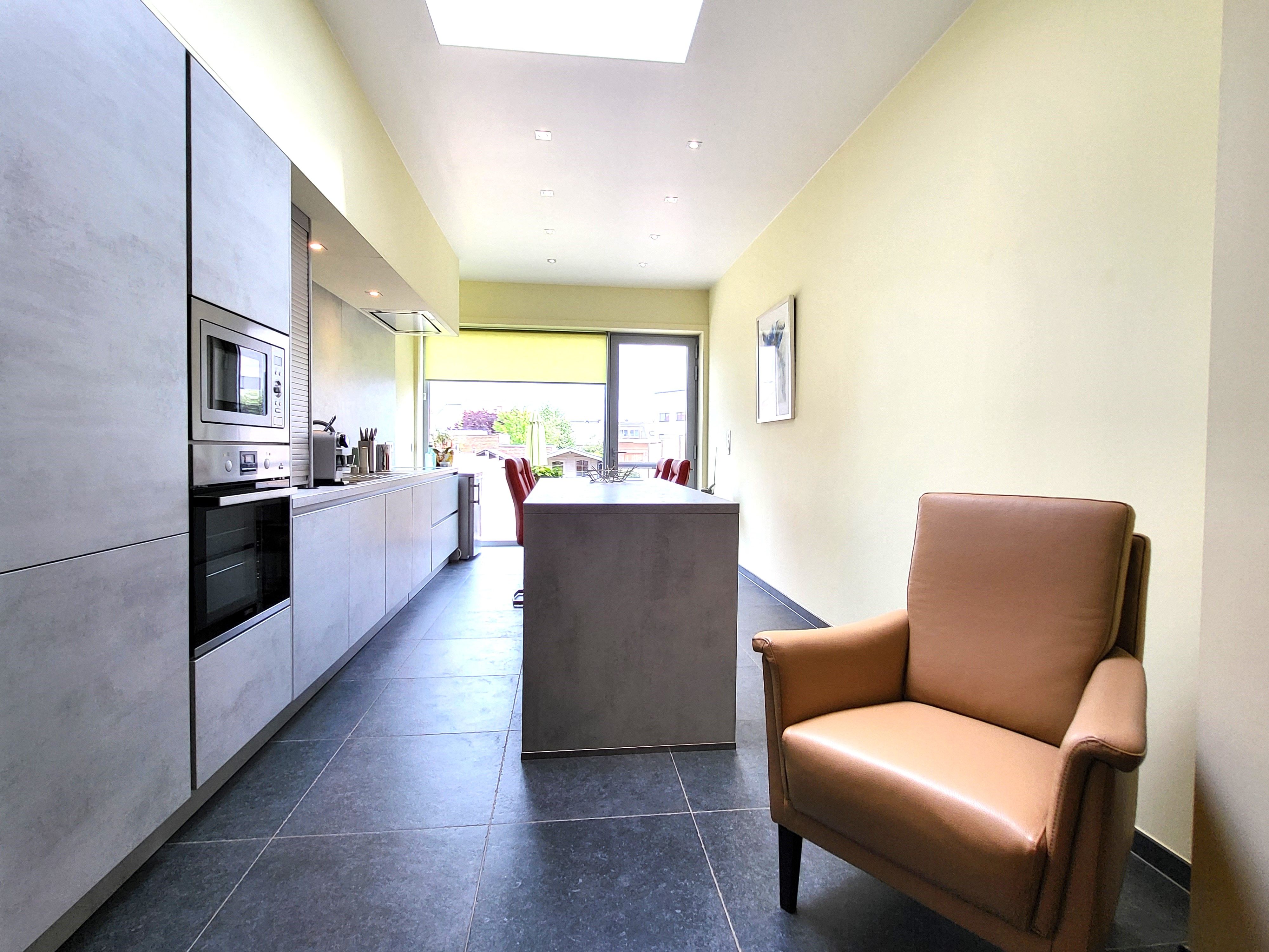 Prachtig onderhouden woning met zonnig tuintje en terras. foto 12