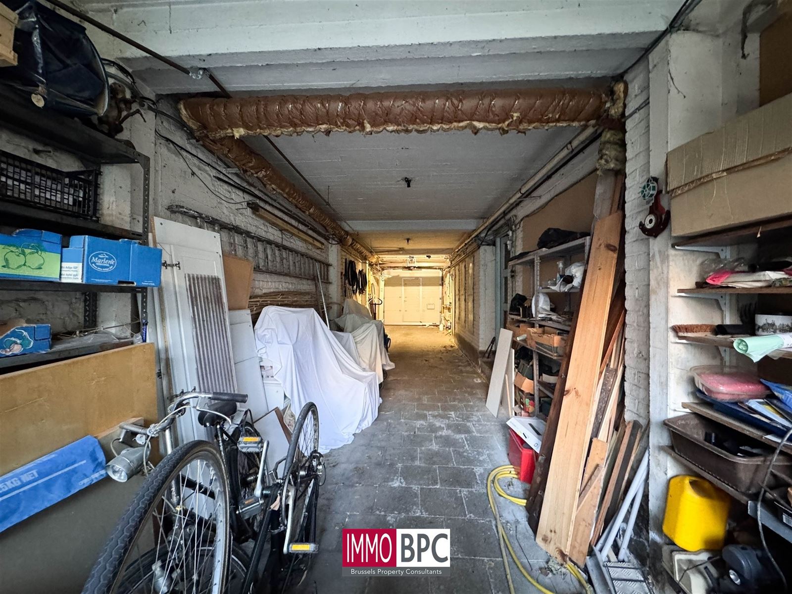 Kleine charmante achterwoning met tuin en dubbele garage te renoveren  foto 25