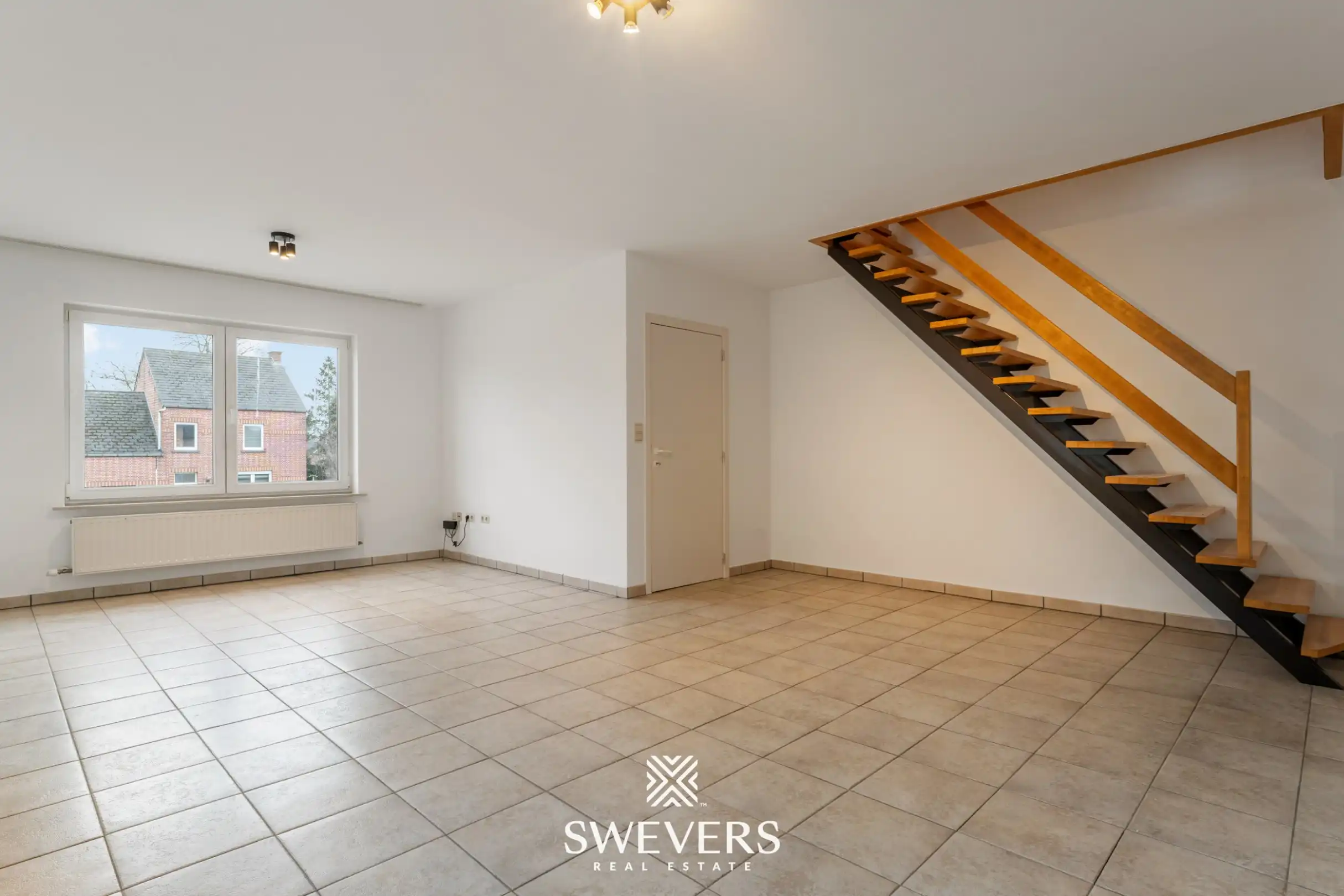 Ruim duplex appartement met 2 slaapkamers, terras en garage in Heusden-Zolder foto 2