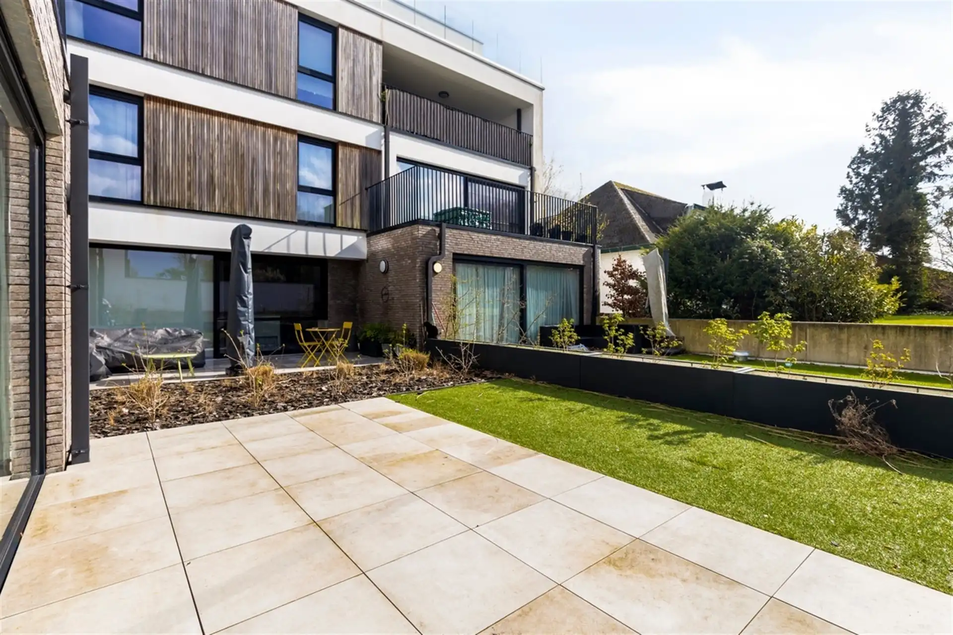 Gelijkvloers appartement met groot terras en tuin foto 7